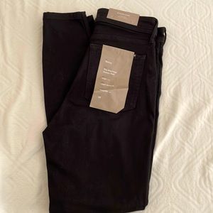 Everlane black skinny jeans.